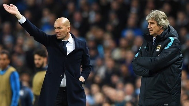 Zinédine Zidane (Real Madrid) & Manuel Pellegrini (Manchester City) Coach Zinédine Zidane of Real Madrid gestures as manager Manuel Pellegrini (R) of Manchester City looks on during their UEFA Champions League semi-final first leg ©Getty Images