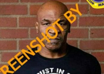 #CekFakta Foto Mike Tyson Mengenakan Baju Bertuliskan “TRUST IN GOD NOT IN VACCINE”