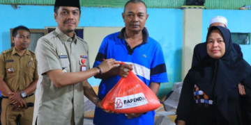 Kaban Bapenda Makassar Silaturahmi Ke Kelurahan Jongaya Sekaligus Serahkan Paket Sembako - Utama