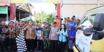 Wali Kota Danny Pomanto Bersama Perum Bulog Sulselbar Lepas Pendistribusian Bantuan Pangan Beras Pemerintah di Makassar - Utama