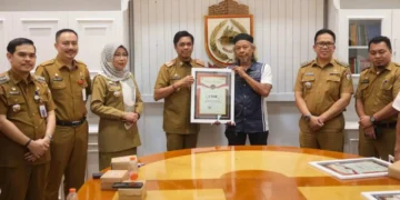 Pj Sekda Kota Makassar Terima Tanah Hibah dari Warga untuk Dijadikan Jalan Umum - Utama