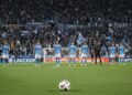 BMKG: Awal Musim Hujan 2026 Langsung Masuk Puncak A busy Citi Field during a high-stakes MLS match between New York City FC and LAFC. The field is illuminated by spotlights, with passionate supporters creating a vibrant backdrop. The focus is on the