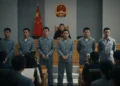 Festival Sakura Fujiyoshida Dibatalkan: Ketika Keindahan Alam Tergerus Overtourism A dramatic courtroom scene where six individuals, including the owner of a kindergarten, are being sentenced for a mass lead poisoning incident that affected 247 children in Tianshui, China. The image captures the gravity of the situation with strong lighting and a sharp focus on the faces of the defendants and the judge, set against a backdrop of a modern courtroom.