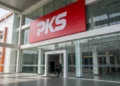 Upacara HUT Ke-81 RI Unik di Hutan Lindung Parigi Moutong: Simbol Kecintaan Bangsa dan Ajakan Jaga Lingkungan A grand entrance of the PKS Party Headquarters with a vibrant red banner and modern glass facade, symbolizing the party's commitment to transparency and fair treatment.