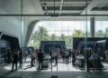 Samsung Galaxy Tab S8 Ultra: Tetap Jadi Pilihan Terbaik Bali Convention Center with its modern glass facade and vibrant interior filled with tech enthusiasts and professionals engaged in discussions and demonstrations, symbolizing the innovation and collab