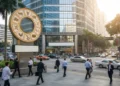 5 Strategi Cerdas Mengelola Keuangan di Tengah Inflasi yang Tak Menentu A modern building with Chinese zodiac symbols, located in a busy urban area, symbolizing business and economic activity.