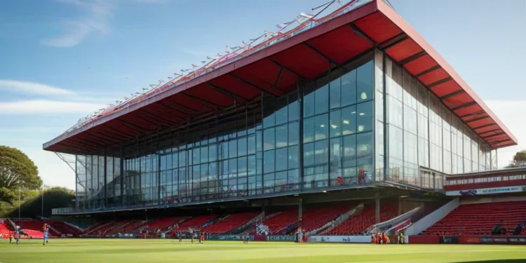 Peringatan Amorim Soal Cisse Sebelum Bournemouth vs Milan St. Mary's Stadium, Bournemouth Football Club, with its red and white striped banners and modern architecture, set against the English countryside, preparing for the match against Milan.