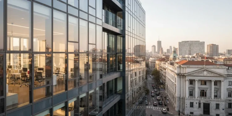 Il Toro vs Monza: Saksikan Pertandingan Ekonomi dan Bisnis di Wartakita.id Il Toro's modern and sleek headquarters with a glass facade and warm interior light, contrasting with Monza's historic and imposing structure with marble columns, symbolizing the economic and business