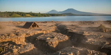 A dramatic landscape view contrasting the aftermath of a magnitude 6.9 earthquake in Vanuatu with the calm and stable landscape of Indonesia, highlighting the seismic activity in Vanuatu and the relative stability in Indonesia.